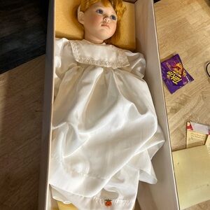 Elegant White Doll with Orange Accent